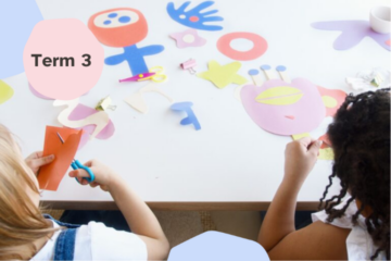 Two children seated at a table cut colorful paper shapes for a craft project. Abstract cutouts and friendly designs are spread across the table. A pastel pink shape on the left reads Term 3.
