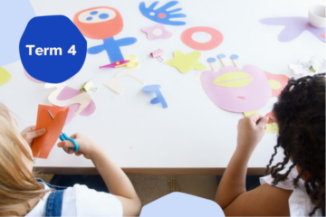 Two children sit at a table, cutting colorful paper shapes for a craft project. Various paper cutouts, including a hand shape and a face, are spread on the table. A blue label reads Term 4.