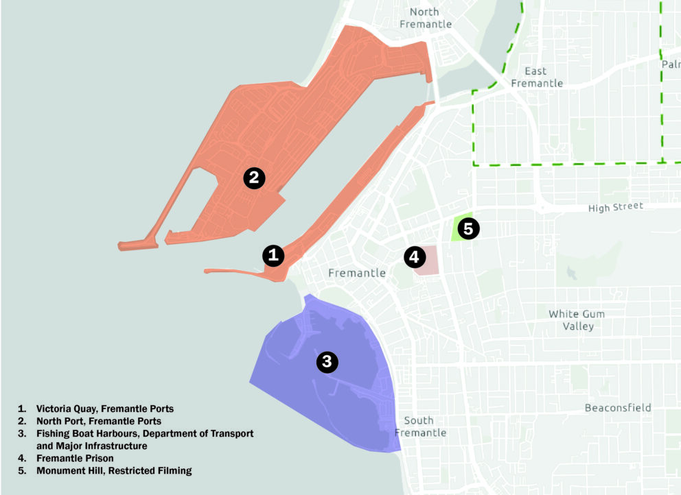 Map of Fremantle showing two port areas highlighted in red (Victoria Quay, North Port) and one area in blue (Fishing Boat Harbour, Fremantle Prison), with numbered labels and a legend indicating restricted filming zones.