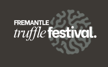 Text reads Fremantle truffle festival. on a dark background, with a stylized, circular truffle graphic resembling a pattern or maze behind the text.