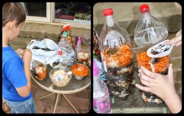 A child stands at a table making compost in plastic bottles using food scraps, shredded paper, and soil. Close-up shows hands layering materials inside the bottles with a spoon.